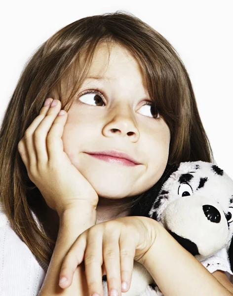 Sweet toddler with puppy soft toy in studio — Stock Photo, Image