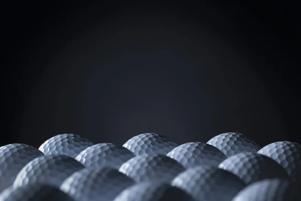 Grupa piłek golfowych odizolowanych na czarnym tle. — Zdjęcie stockowe