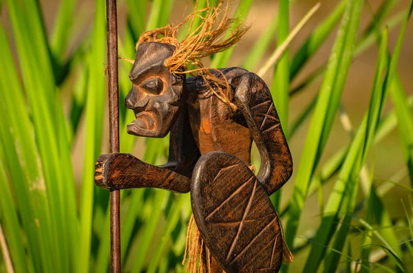 Figurine of an ancient warrior in nature