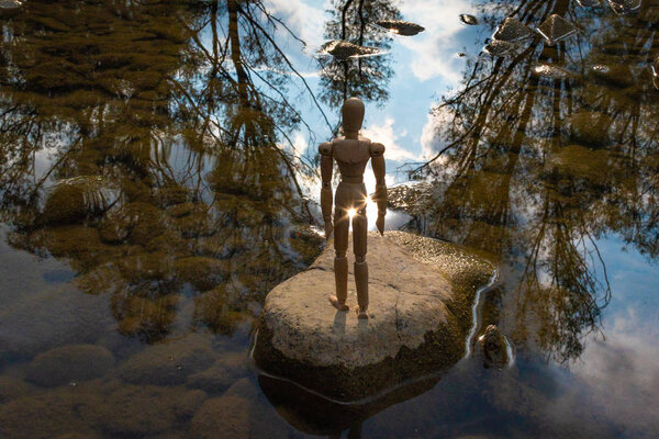 Articulated little man contemplates