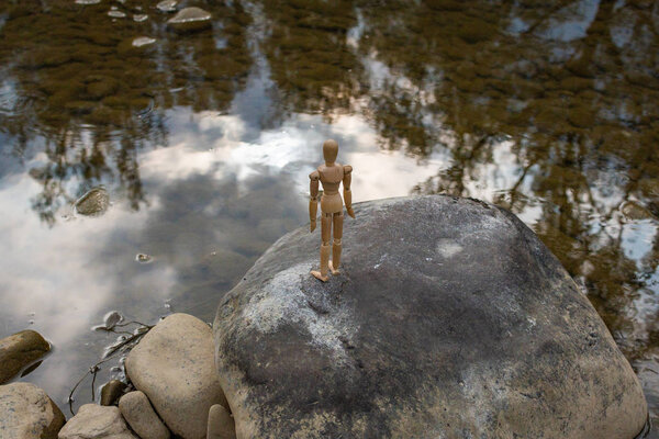  Articulated little man contemplates