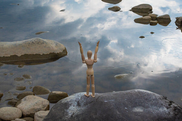 Articulated little man contemplates