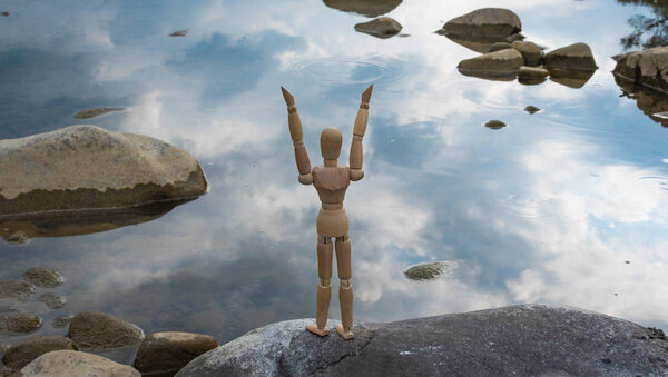 Articulated little man contemplates