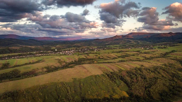 Aerial photography of the countryside in the Carpathians at sunset