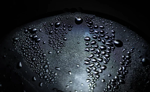 Water droplets on a misted glass