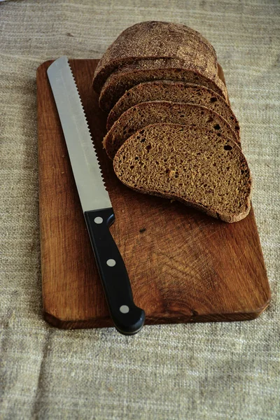 Freshly Baked Bread Wooden Cutting Board Knife Cutting Bread — Stock Photo, Image