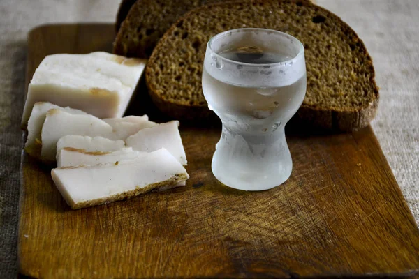Freshly Baked Bread Wooden Cutting Board Bacon Shot Vodka — Stock Photo, Image
