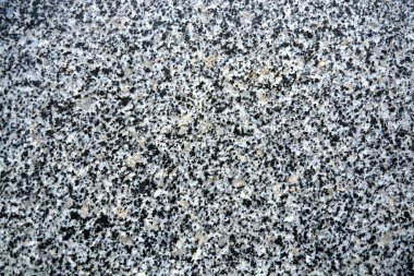 Doğal taş granit. Granit doku, granit arka plan, dekoratif tasarım, tasarımcılar için bir araç. Kaplama malzemesi, dikişsiz sert yüzey