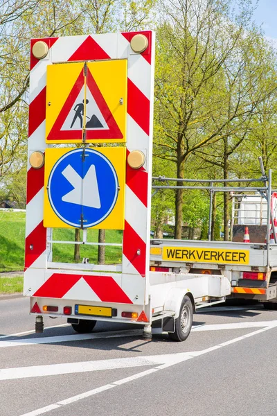 Dutch road works with truck and traffic signs — Stock Photo, Image