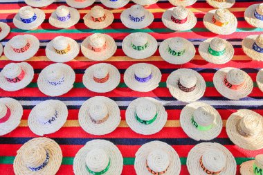 Many summer hats made of sisal ropes clipart