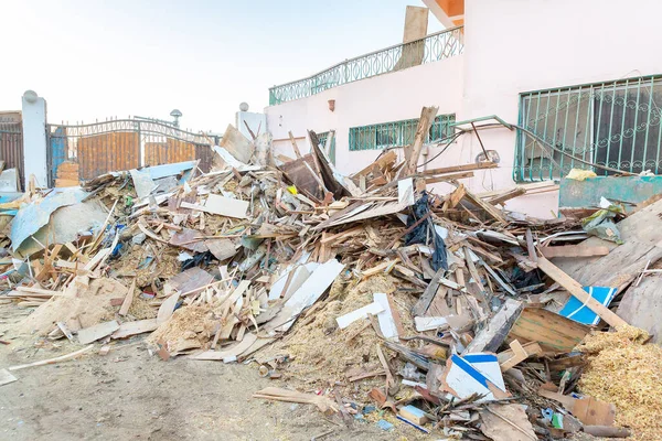 Pile of waste on yard of shipyard in city Hurghada Egypt