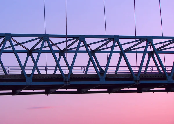 Kutai Kartanegara Bridge stands firm at sunrise. Silhouette bridge looks beautiful.