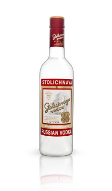 CHISINAU, MOLDOVA - May 21, 2018: A bottle of Stolichnaya vodka isolated on an white background. Russian traditional alcoholic beverage, produced in Russia at Cristal enterprises clipart