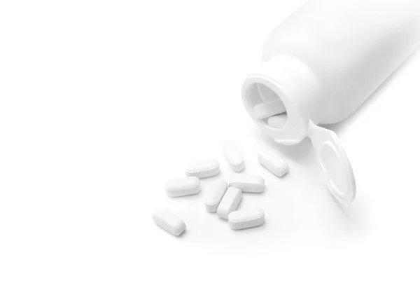 Pillole Bianche Versate Una Bottiglia Aperta Isolata Uno Sfondo Bianco — Foto Stock