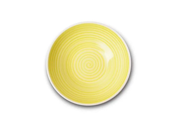 Пустая желтая керамическая плита со спиральным рисунком в акварельных стилях — стоковое фото