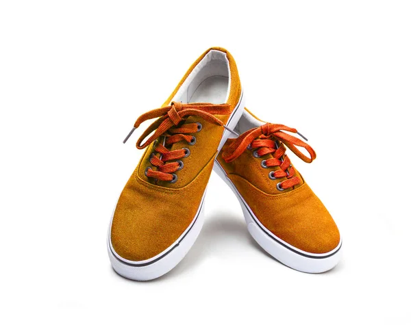 Un par de zapatos de lona de color naranja aislados en blanco —  Fotos de Stock