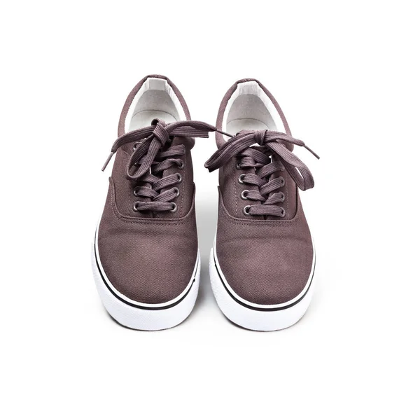 Um par de sapatos de lona marrom isolado em branco — Fotografia de Stock