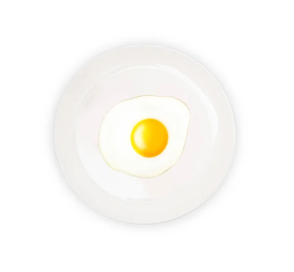 Top view of white dish with fried egg isolated on white — Stock Photo, Image