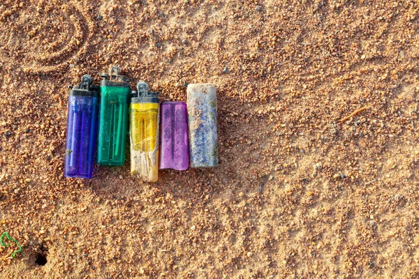 Old lighters placed on the ground