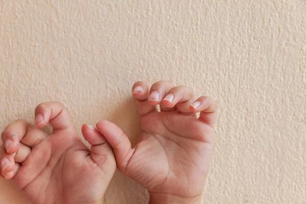 Nail clippers at your finger. Close up of fingernail cutting. Di