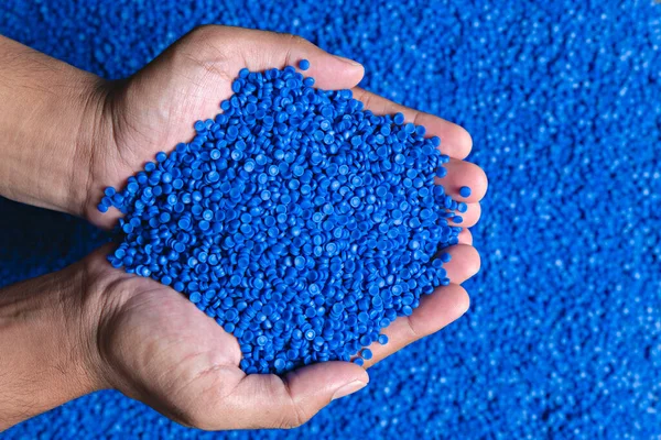 Blue Plastic Grain Plastic Polymer Granules Hand Hold Polymer Pellets — Stock Photo, Image