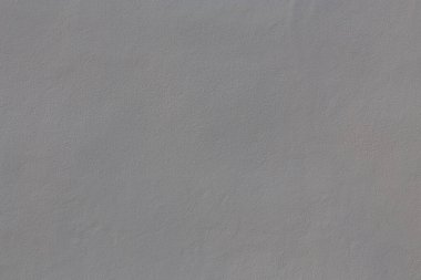 Doku arka planı için beton beyaz duvar. Kirli beyaz beton duvar. Ev dekorasyonu konsepti. Standart olmayan ev boyası kullanımının sonuçları..