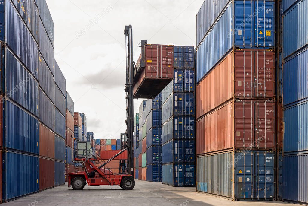 Folk lift car working in container yard for preparing imported or exported products background,Container Trainer full of products for delivery to customer