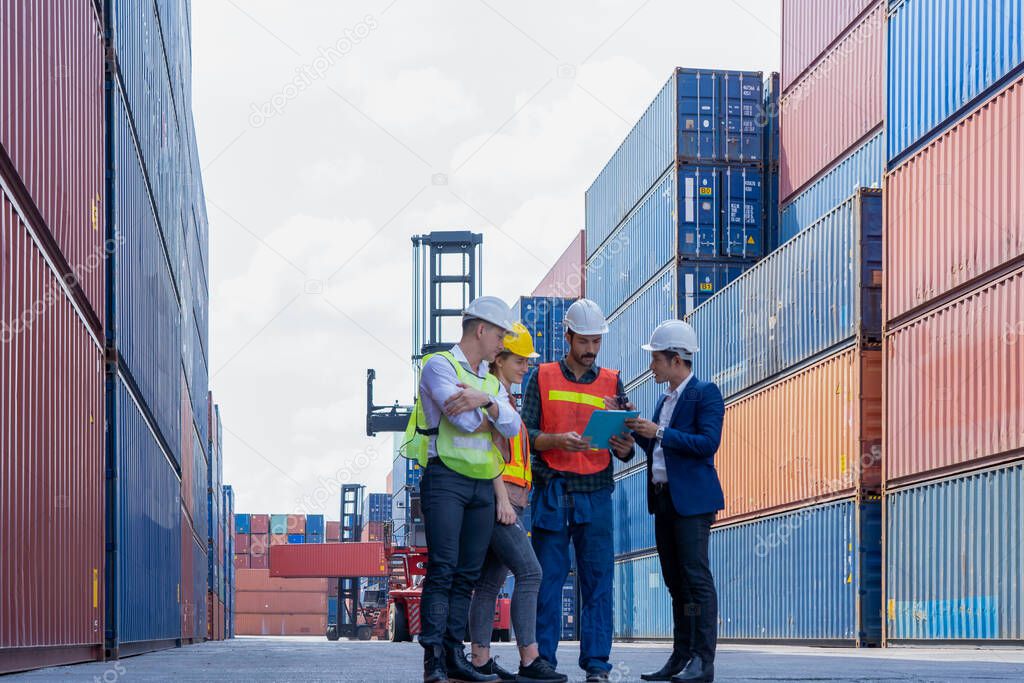 Engineer team planning the transportation of goods for import Or export in the container yard,engineer team inspect and plan to prevent errors and work together efficiently successfull.