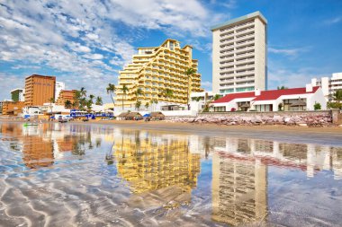 Mazatlan, Mexico-10 December, 2018: Mazatlan Golden Zone (Zona Dorada), a famous touristic beach and resort zone in Mexico clipart