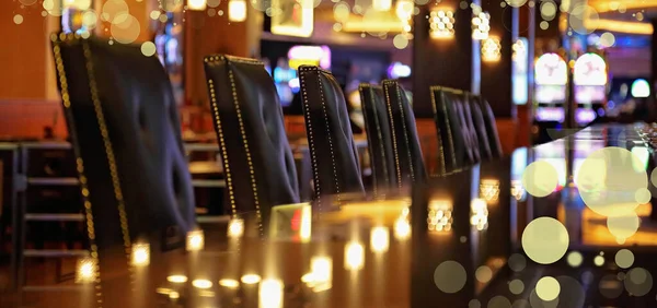 Casino chairs in the entertainment area at night