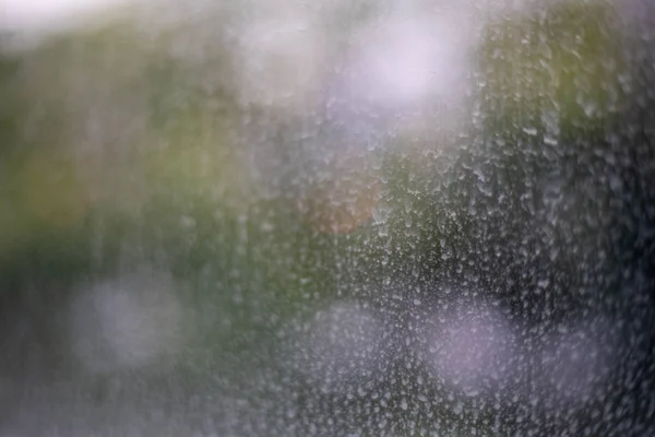 windows glass with with dust mix with rain