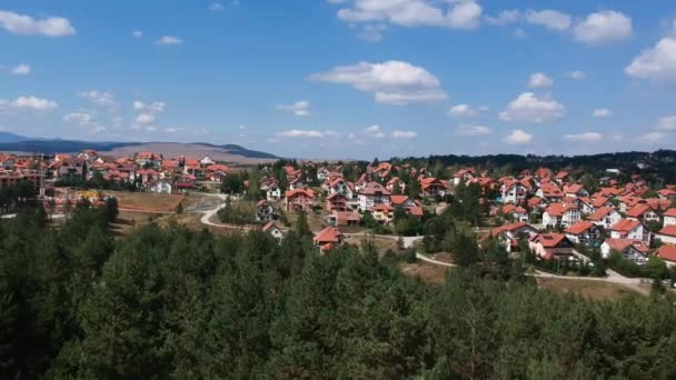 Mountain village skyline. Aerial view of pine forest at Zlatbor mountain, Serbia — Stock Video