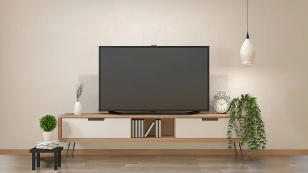 TV no armário na sala de estar zen com lâmpada, mesa, armário e pla — Fotografia de Stock