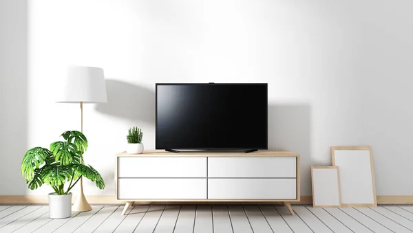 TV no armário na sala de estar moderna com lâmpada fames e planta em — Fotografia de Stock