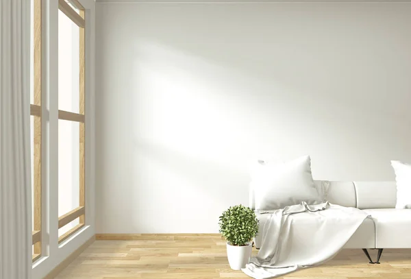 Современный интерьер гостиной с диваном и зелеными растениями — стоковое фото