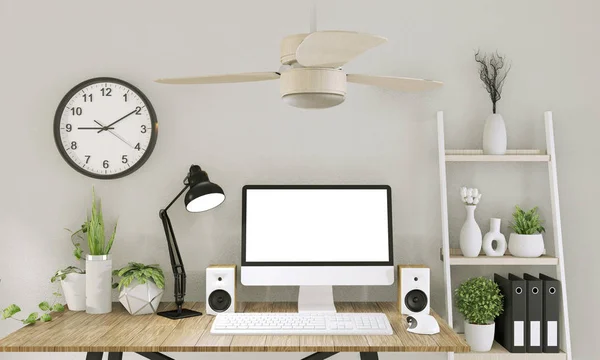 Mock up computer with blank screen  and decoration in office roo