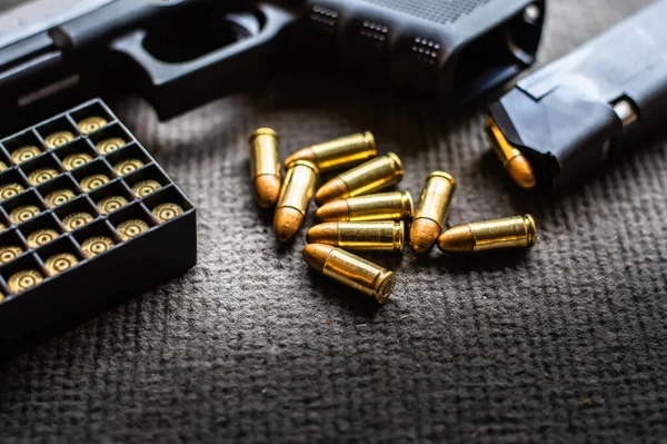 Bullets Gun Black Velvet Desk — Stock Photo, Image