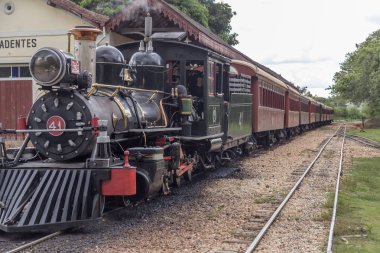 Tiradentes, Minas Gerais, Brazil - July 3, 2015: the vintage traing that travels from Tiradentes to So Joo del Rei, at the Tiradentes Station clipart