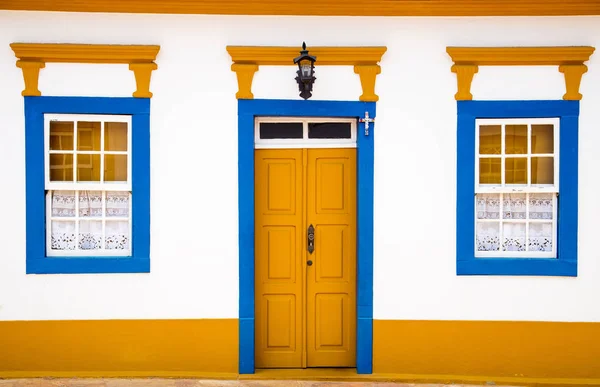 Colorful door and windows of a colonial house in the historical town of Tiradentes, Minas Gerais, Brazil