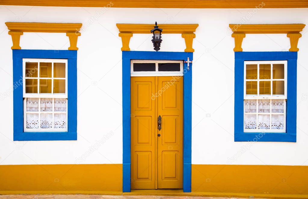 Colorful door and windows of a colonial house in the historical town of Tiradentes, Minas Gerais, Brazil