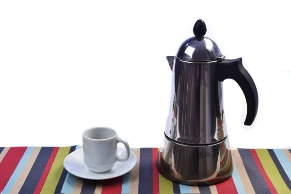 Cup of coffee with coffee maker on the table seen from above — Stock Photo, Image