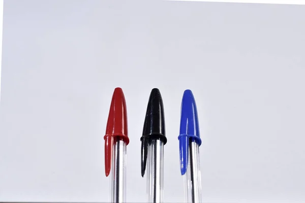 Colorful ballpoint pens on white background — Stock Photo, Image