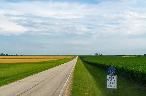 Rural two lane highway through the farmland.  LaSalle County, Illinois, USA