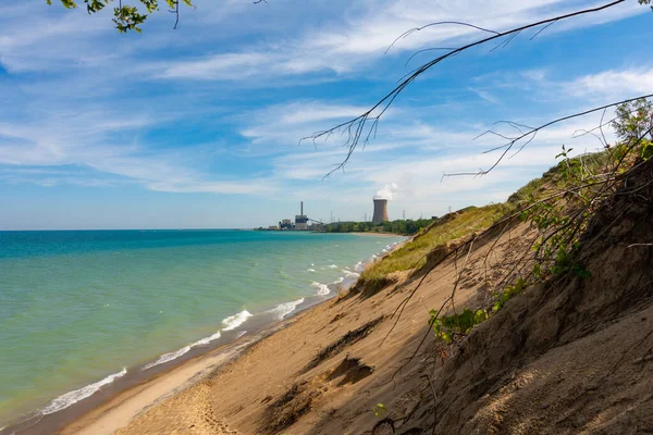 Sand dune meeting the shoreline of Lake Michigan.  Indiana Dunes National Shoreline