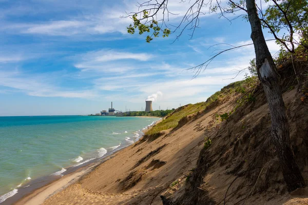 Sand dune meeting the shoreline of Lake Michigan.  Indiana Dunes National Shoreline
