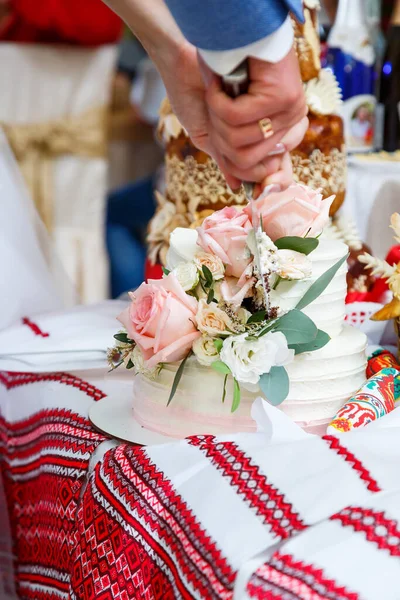 Big sweet wedding cake for newlyweds