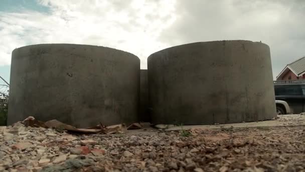 Concrete rings for a well or septic system. — Stock Video