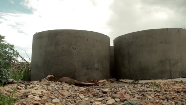 Concrete rings for a septic system or well. — Stockvideo