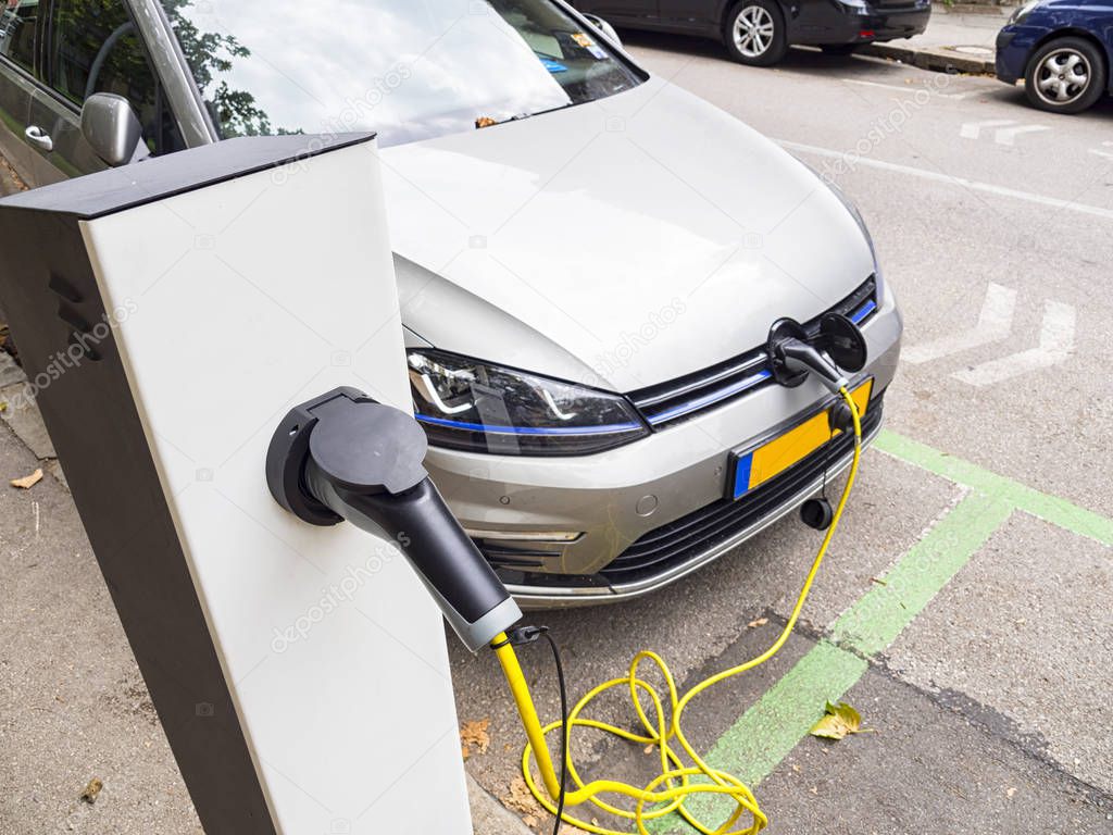 Electic car charging scene