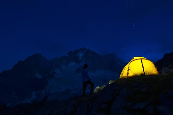 Hiking tent in the italian alps at night